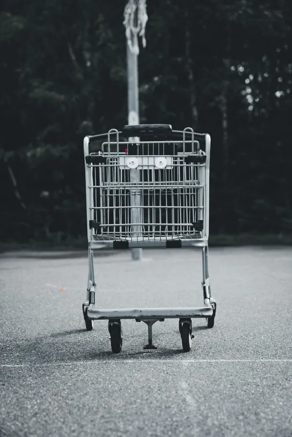 Shopping cart in a retail parking lot